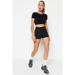 Trendyol Black Extra Short Sport Shorts Tights with reflective print detail at the waist.