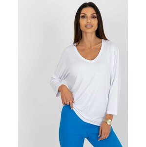 White women's basic blouse of oversize cut
