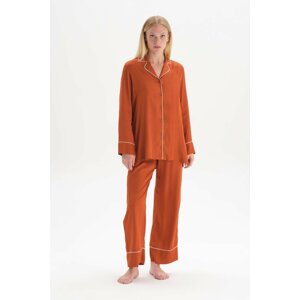 Dagi Pajamas with a tile jacket collar and long sleeves with piping.