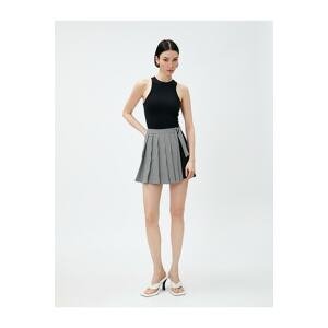 Koton Pleated Mini Skirt with Contrast Detail Belt.