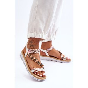 Comfortable women's sandals on the lap of White Jodie