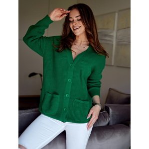 Loose women's sweater with green buttons