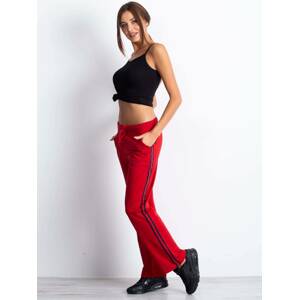 Sports pants decorated with stripes red