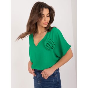 Green women's oversize blouse with flower