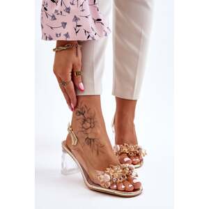 Fashionable transparent sandals with Carmelo gold ornaments