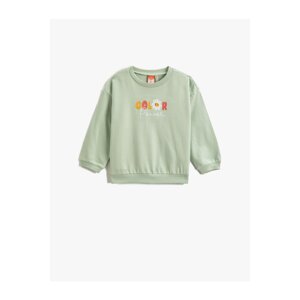 Koton Floral Print on the Back Sweatshirt with Embroidered Detail.