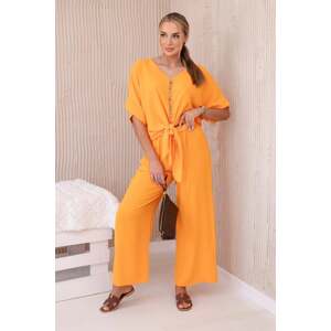 Set of bright orange blouse and trousers